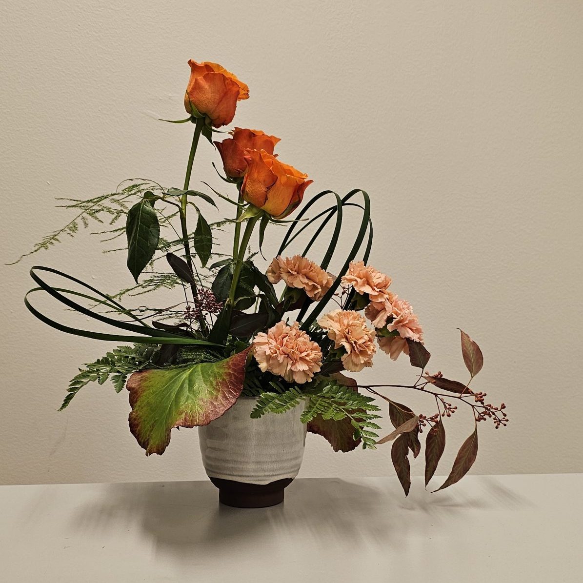 Asymmetrisk dekoration i kruka